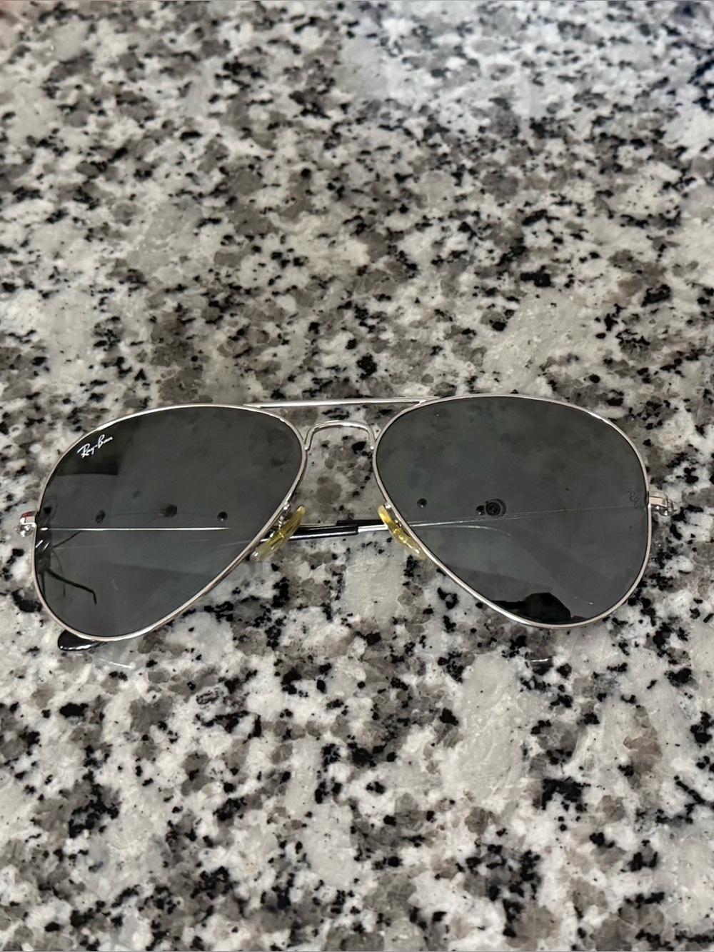 Ray-Ban Silver Frame Aviator Sunglasses with Dark Gray and silver flash.